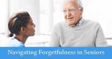 Navigating Forgetfulness in Seniors: Recognizing Signs and Taking Action. Picture of a young black female nursing aide talking with an older caucasian male